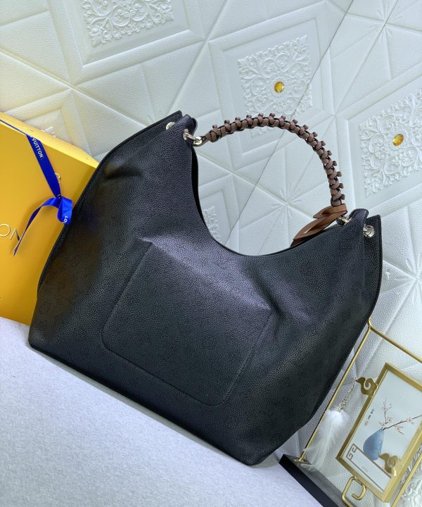 99b51b33be254119a9a1bcabc25bc819-1